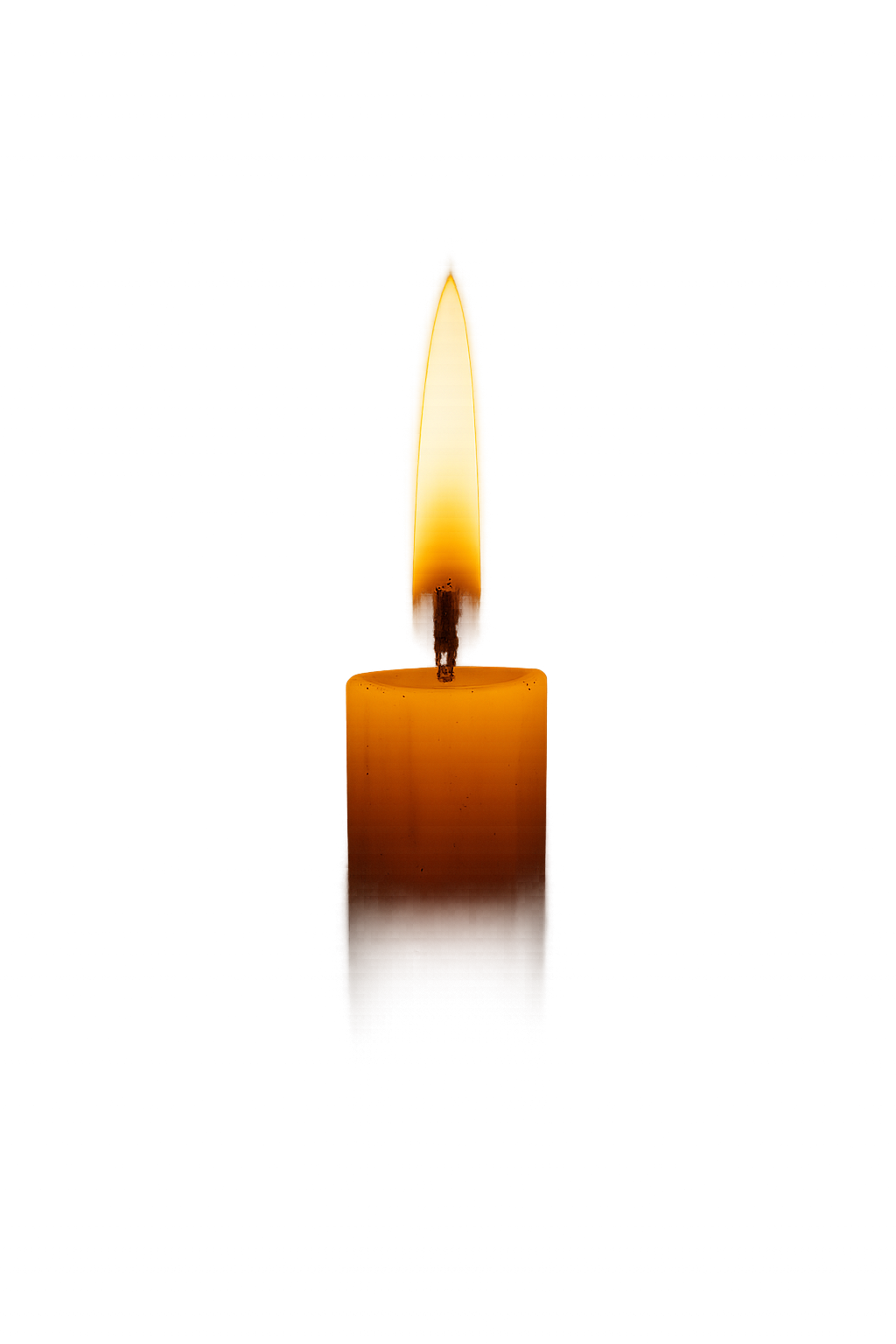 A single lit candle in darkness